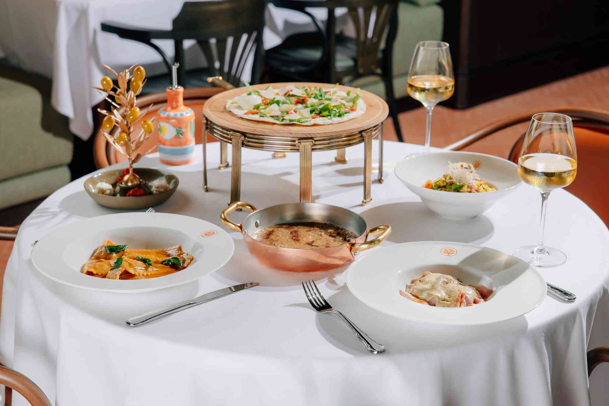 dining table with different italian food